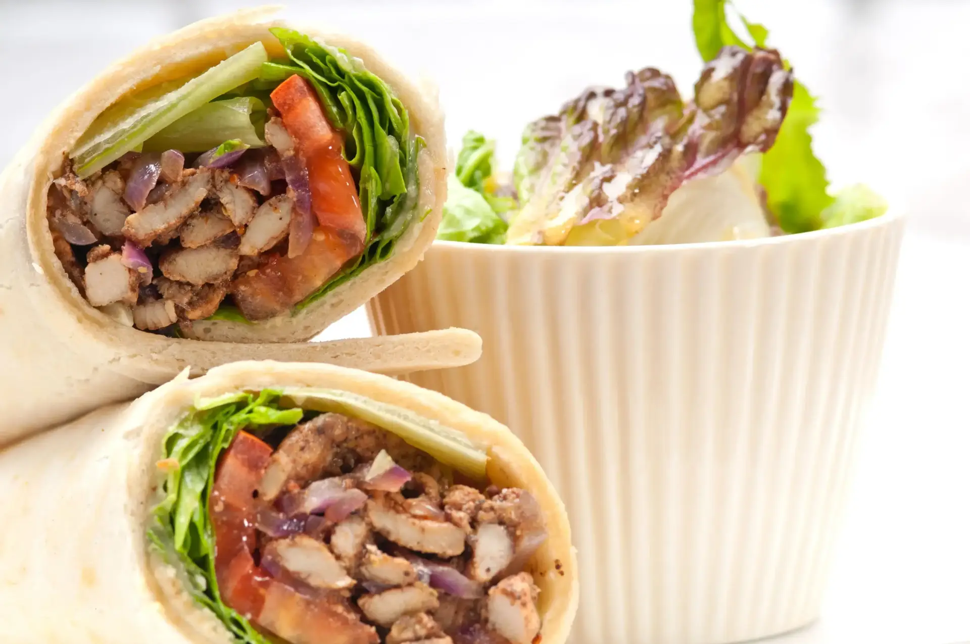 Aladdin Mediterranean Cuisine signature dishes Chicken Shawarma Sandwich
Lamb Gyro Wrap
Traditional Hummus